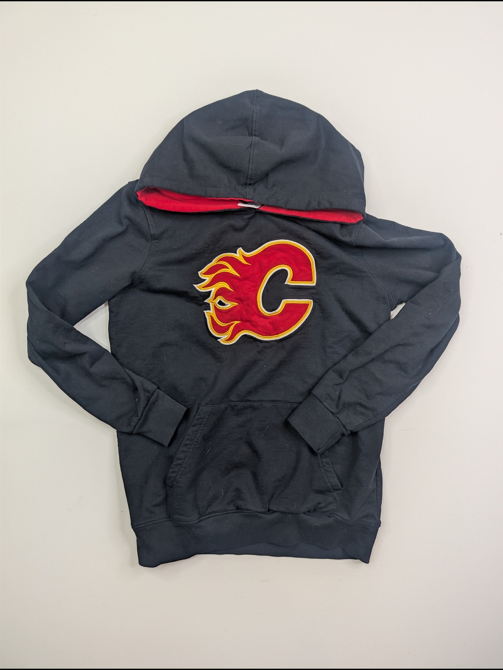NHL Kids Black Hoodie with Red and Gold Flames Logo